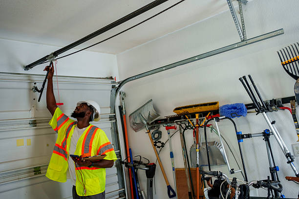 Professional Garage Door Panel Replacement technician working in La Follette, TN